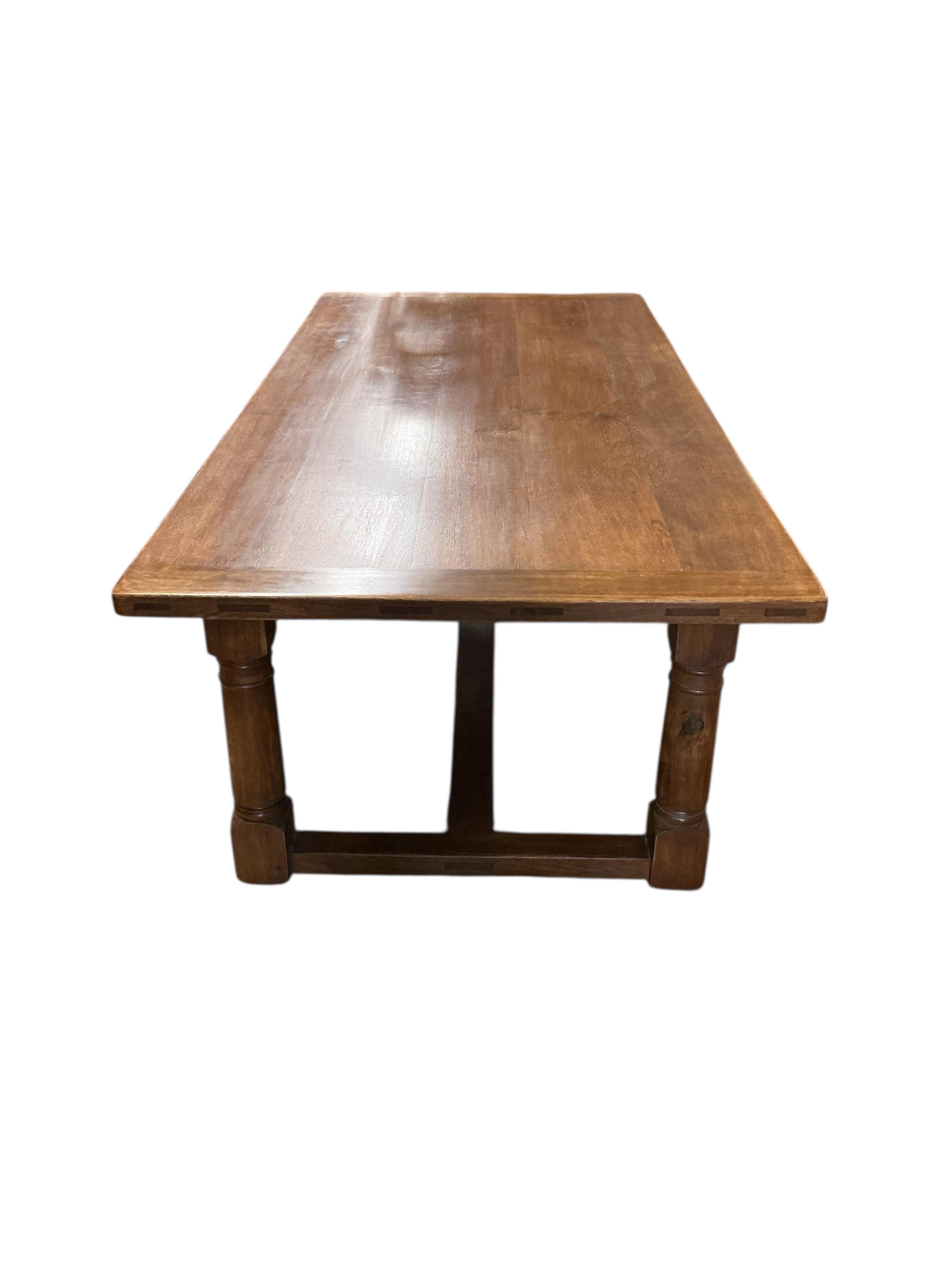 An 18th century style rectangular oak refectory dining table, width 229cm, depth 107cm, height 78cm
